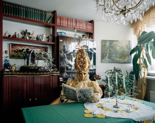 Illustration for article titled Photographs of cosplayers at home capture both the person and the mask